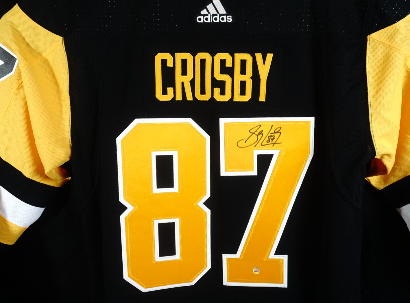 Camiseta de hockey de los Pittsburg Penguins firmada por Sidney Crosby, n.° 87
